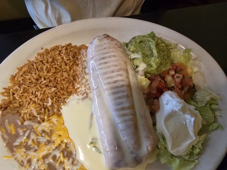 Colorful Mexican dishes on a restaurant table.