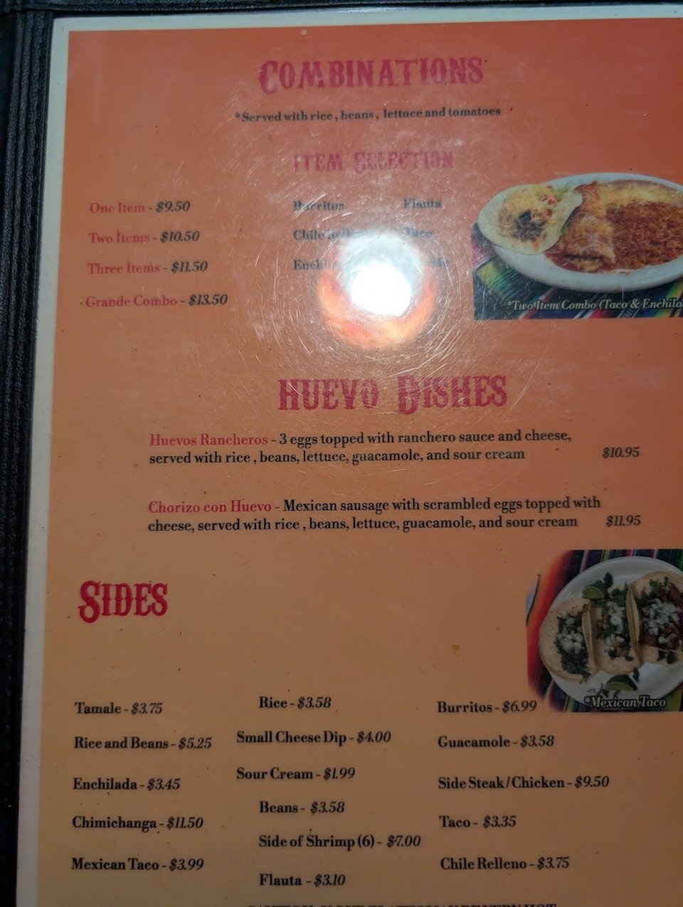 Printed menu pages with Mexican dishes listed.